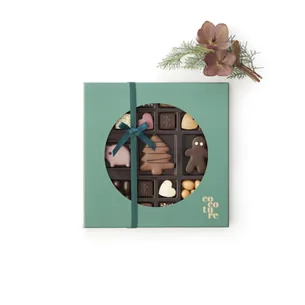 Fyldte chokolader, marcipan og overtrukne mandler i grøn Cocoture æske