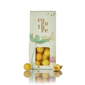 Hvide chokoladekugler m/ exotic fruitcreme i lysegrøn Cocoture dragébox  - 95-100g