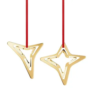 Georg Jensen jul 2021 juleornament - 3- og 4- sidet stjerner - messing belagt med 18 kt guld  : Erling Christensen Møbler